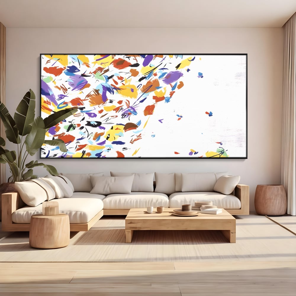 Tablou canvas cu pictura abstracta cu frunze colorate, in rama de aluminiu negru, pe perete intr-un living